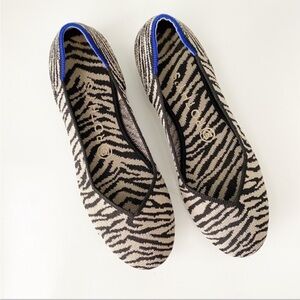 Rothy's Black and Cream Flats with Zebra Print